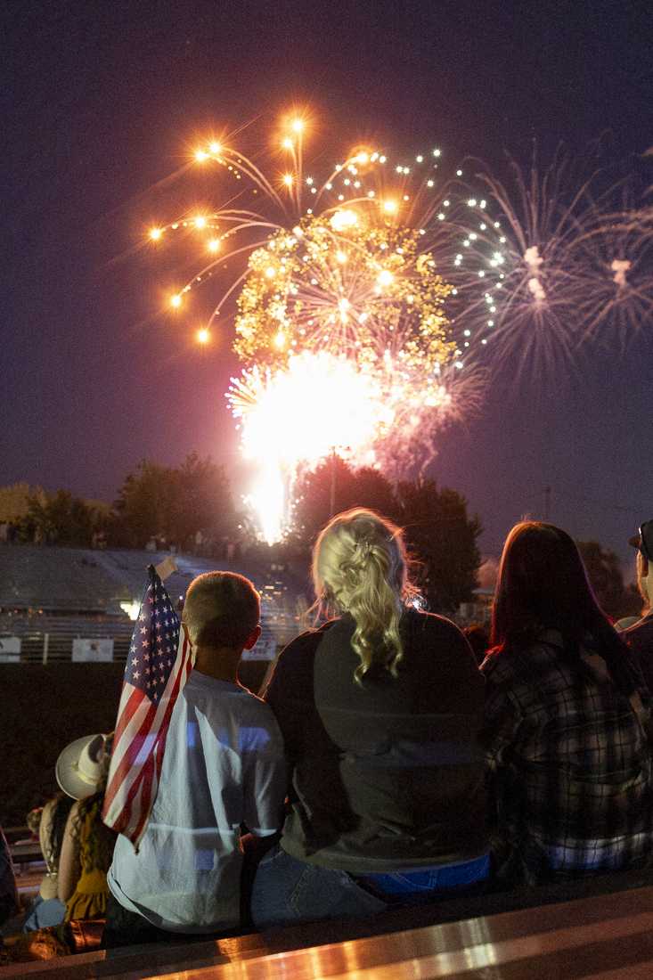 People watch the fireworks show held after the rodeo on July 3, 2024. The Eugene Pro Rodeo kicked off its first day with the theme of "Tough Enough to Wear Pink," in support of cancer awareness. (Alex Hernandez/Emerald)