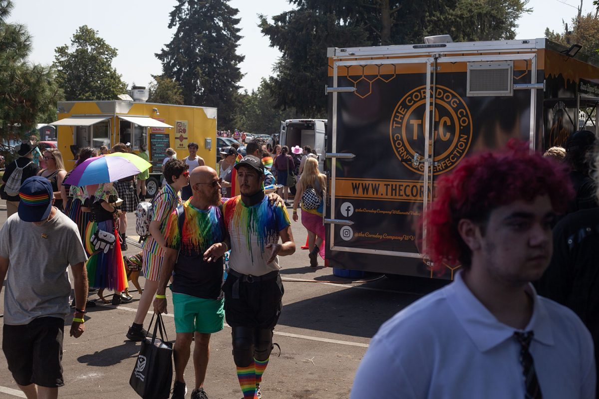 Crowds gather around food trucks serving anything from Soft Serve to Burritos. (Miles Cull/Emerald)