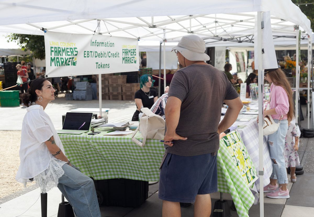 Tuesdays 9 a.m. to 2 p.m., customers and vendors descend on the Lane County Farmers Market to buy and sell anything from produce and pastries to massages and mushrooms. (Miles Cull/Emerald)