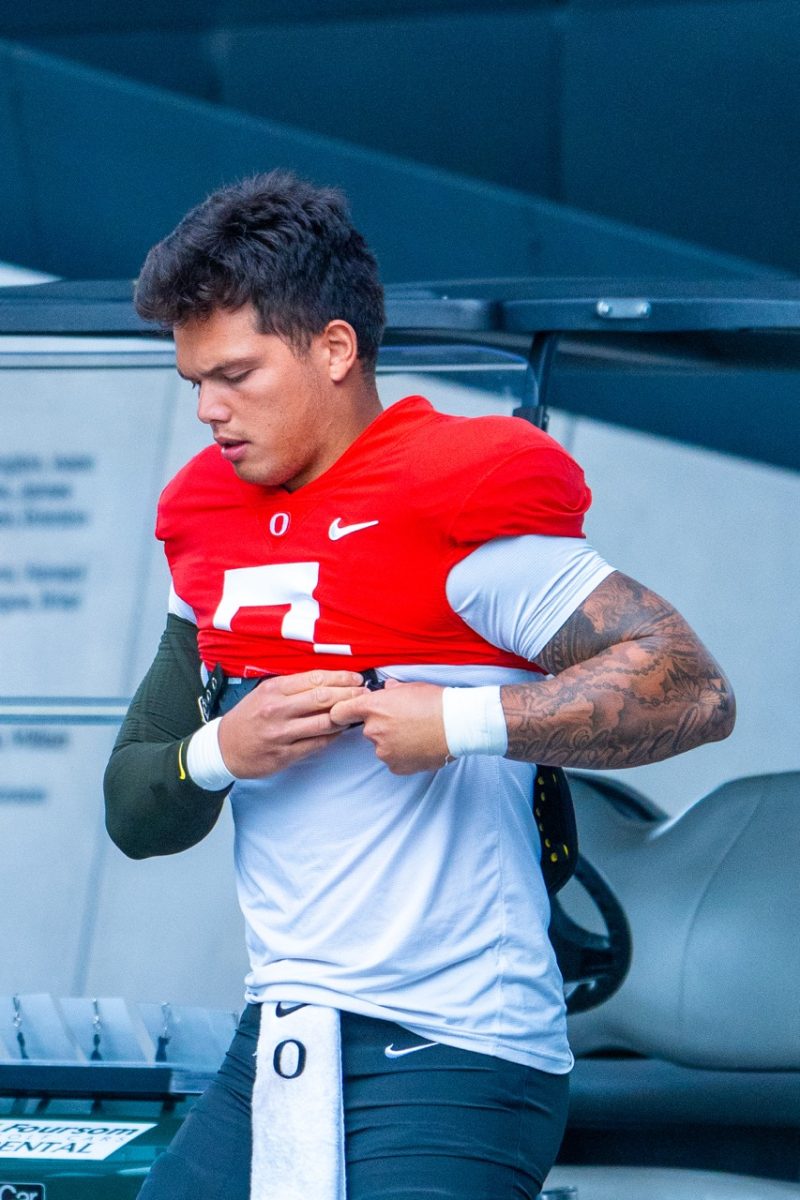 Dillon Gabrial(8) walking into practice at Oregon football practice at the practice facility. (Spencer So/Emerald)