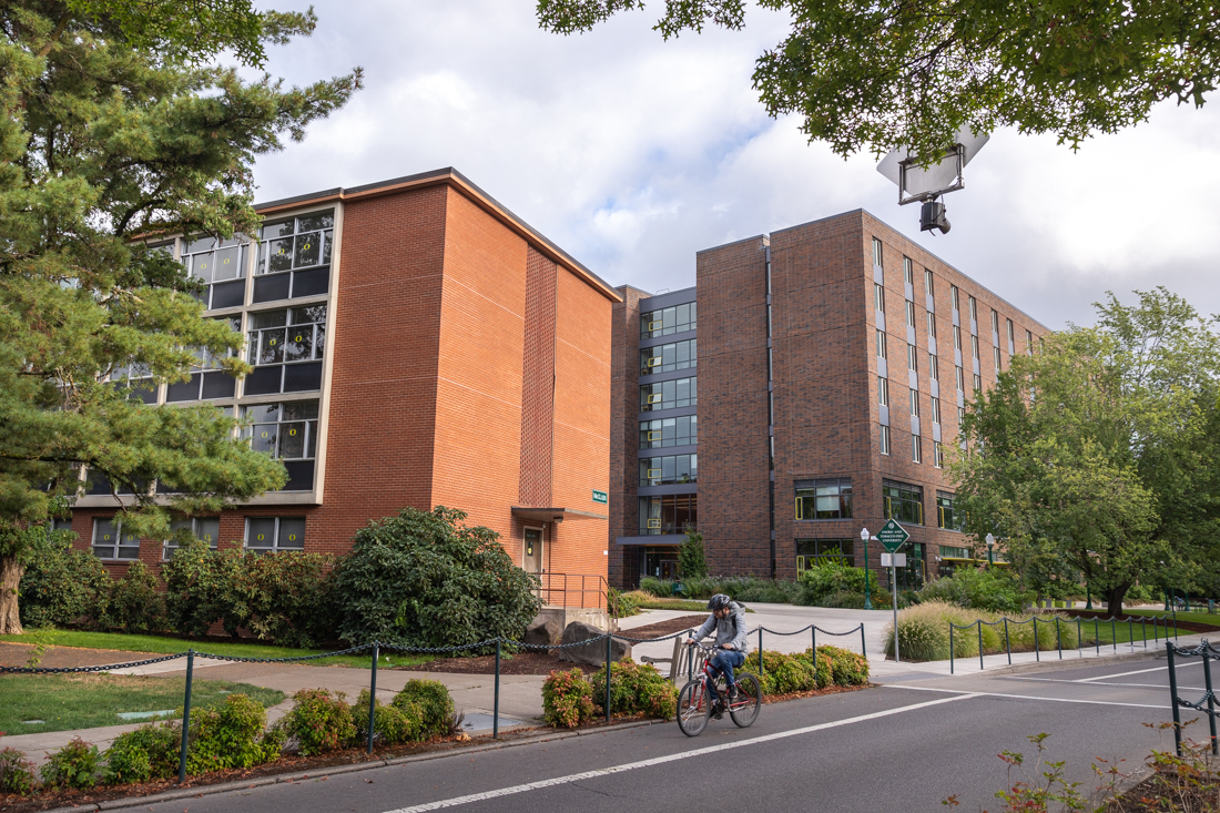 Hamilton Hall, built in the 1960s, sits in front of Unthank Hall, built in 2021. (Molly McPherson/Emerald)