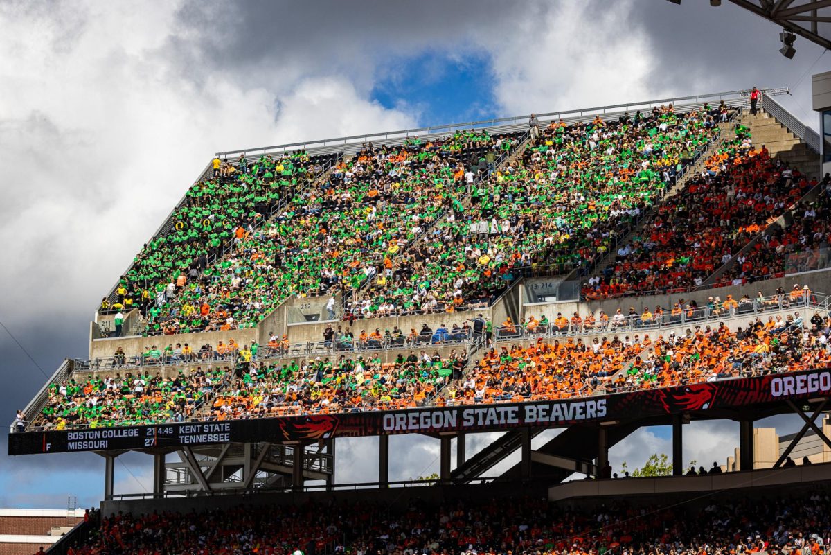 The Oregon Marching Band and many Duck fans are tucked away at the top of the newly renovate Reser Stadium, but make sure their presence is still notice by the rival fans. The Oregon Ducks travel up to Corvallis to face their in-state rival the Oregon State Beavers on September 14th, 2024. (Jonathan Suni/Emerald)