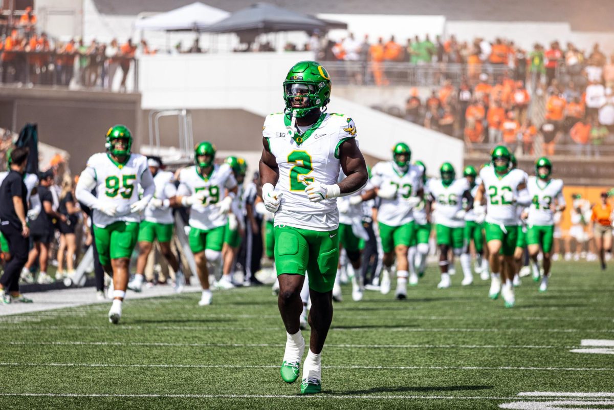 Oregon Duck linebacker, Jeffrey Bassa (2), leads his team out the visiting locker room and onto the field as they are showered with "boos" from the home crowd. The Oregon Ducks travel up to Corvallis to face their in-state rival the Oregon State Beavers on September 14th, 2024. (Jonathan Suni/Emerald)