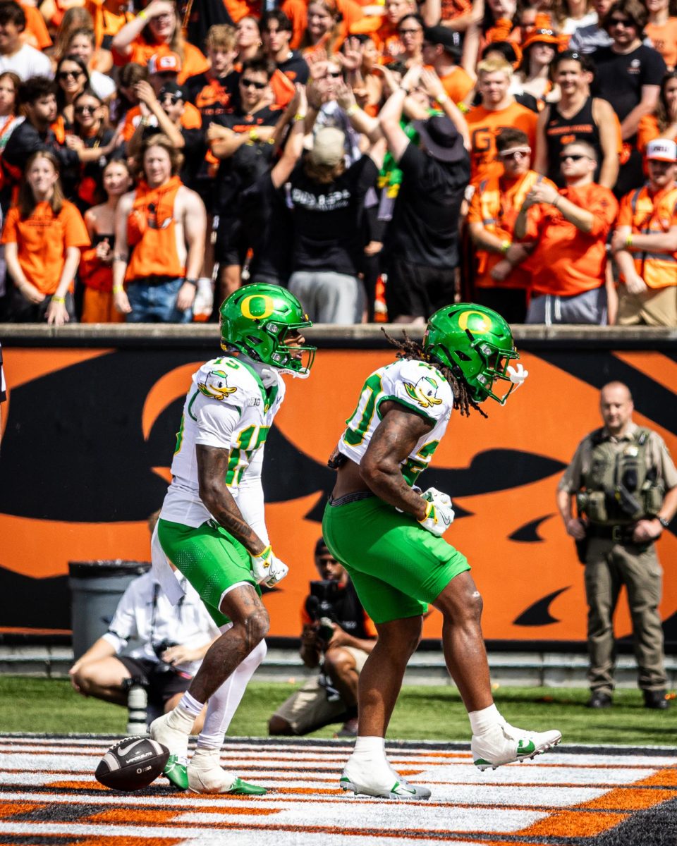 The Ducks celebrate a great drive capped off with a touchdown to get the offense rolling against the rival Beavers. The Oregon Ducks travel up to Corvallis to face their in-state rival the Oregon State Beavers on September 14th, 2024. (Jonathan Suni/Emerald)