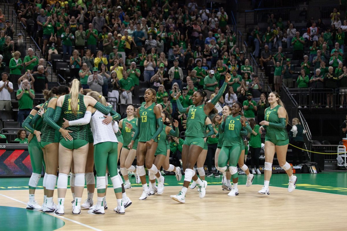 The Ducks celebrate after their win. The University of Oregon Ducks crushed the Oregon State Beavers 3-0 Sunday. (Miles Cull/Emerald)