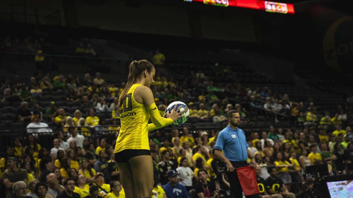 Oregon player prepares to serve the ball. (JR Quint/Emerald)