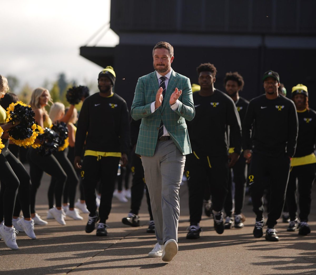 Dan Lanning and his Ducks walk into Autzen Stadium to take on the Michigan State Spartans. Photo: Eddie Bruning