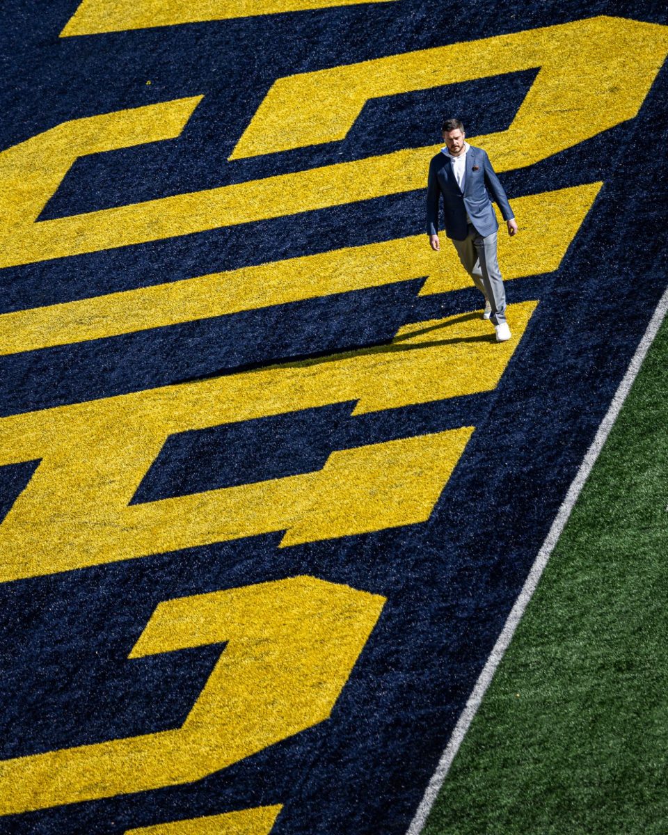 Dan Lanning takes a lap around the field in the iconic "Big House" as he prepares to keep his team perfect on the season. The number 1 ranked Oregon Ducks takes on the Michigan Wolverines on Nov. 2, 2024, at the iconic 'Big House" in Ann Arbor, Mich. (Jonathan Suni/Emerald)