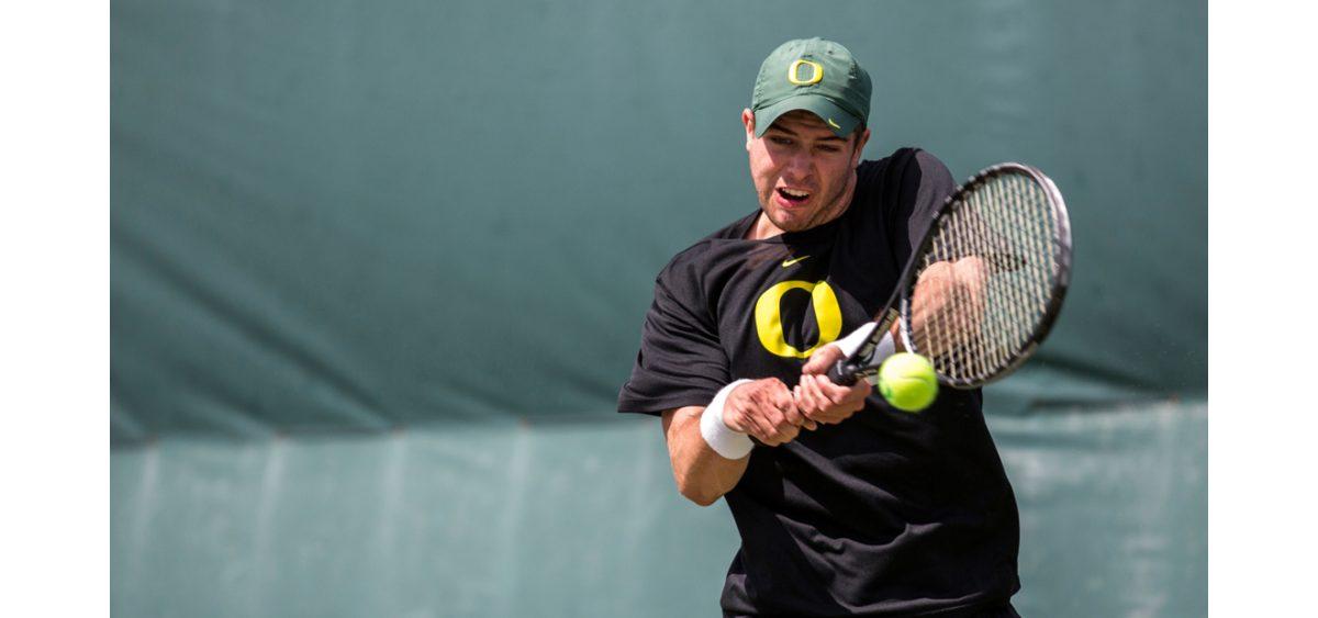 Oregon&#8217;s Daniel Sardu returns the ball to Viktor Farkas en route to a 2-0 win for the Ducks. (Ryan Kang/Emerald)