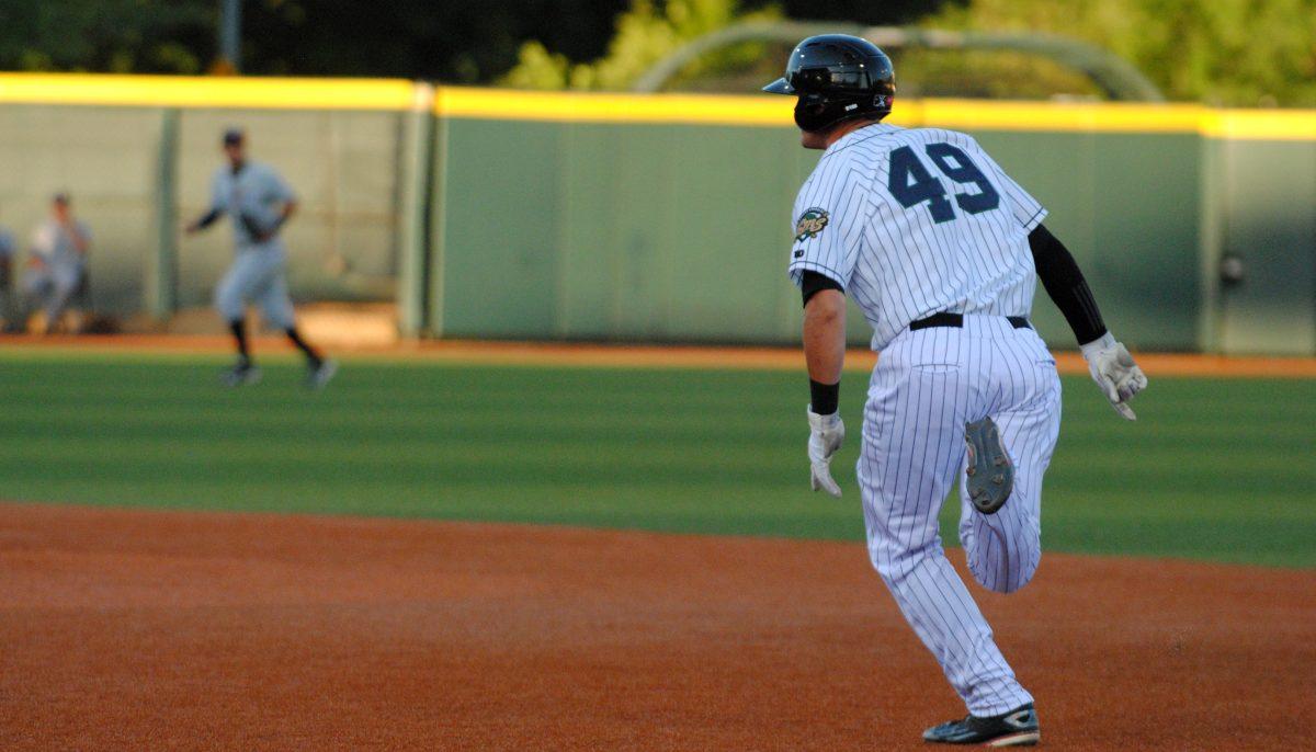 Third baseman Blake Headley stole second while wearing the white and blue retro jersey. (Cooper Green/Emerald)