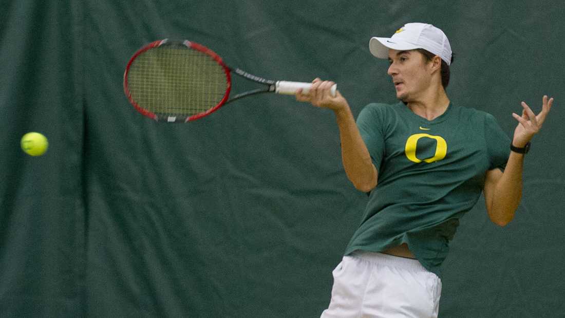 Jayson Amos returns a serve during his doubles match. The No. 37 Oregon Ducks face the No. 67 Boise State Broncos at the Oregon Student Tennis Center in Eugene, Ore. on Feb. 21 2016. (Adam Eberhardt/Emerald)