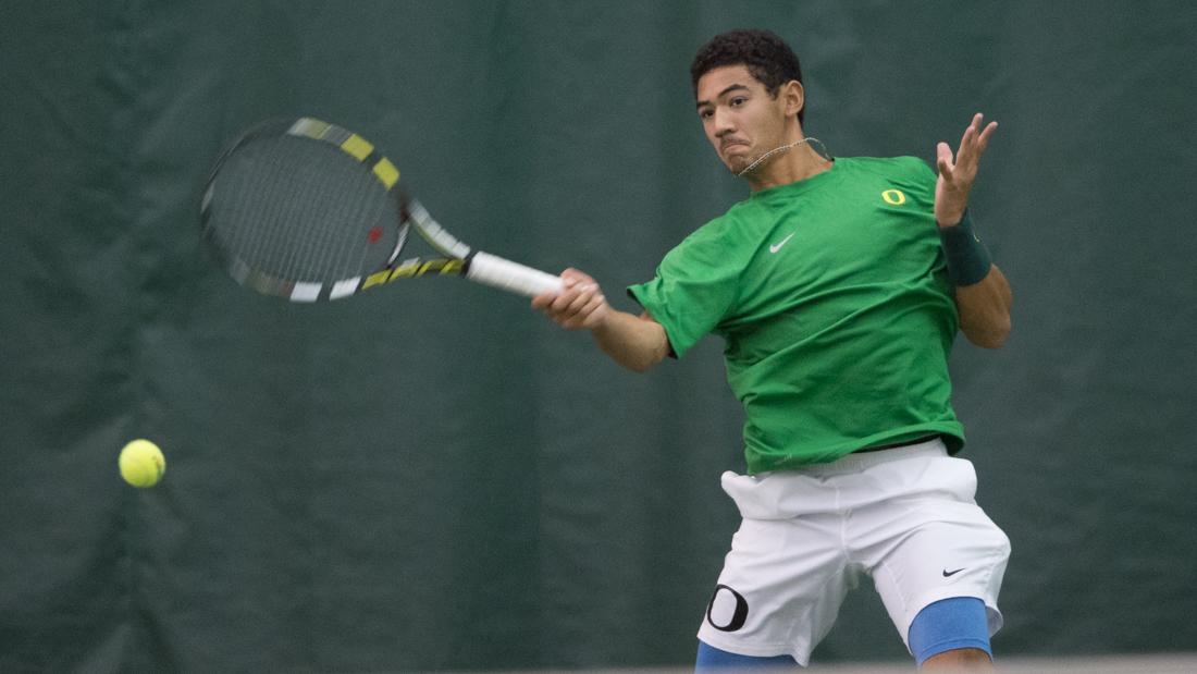 Ethan Young-Smith returns the ball to his opponent during his singles match. The No. 42 Oregon Ducks face the No. 46 Louisville Cardinals at the Oregon Student Tennis Center in Eugene, Ore. on Feb. 7 2016. (Adam Eberhardt/Emerald)