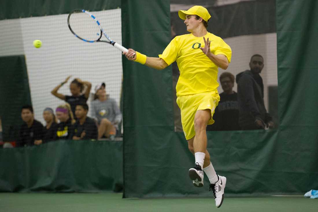 Cormac Clissold hits the ball back to his opponent during his singles match. The No. 20 Oregon Ducks face the Fresno State Bulldogs at the Oregon Student Tennis Center in Eugene, Ore. on March 12, 2016. (Adam Eberhardt/Emerald)