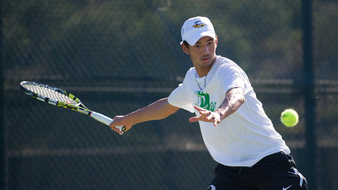 Ethan Young-Smith goes to hit the ball back to his opponent during his singles match. The No. 39 Oregon Ducks take on the Arizona Wildcats at the Oregon Student Tennis Center in Eugene, Ore. on April 1, 2016. (Adam Eberhardt/Emerald)