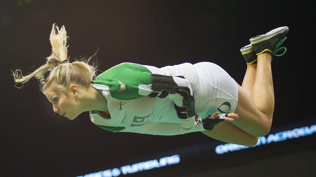 Oregon base Reagan Trussell (19) flips in the air during the team routine. The No. 2 Oregon Ducks face the No. 5 Quinnipiac Bobcats at Matthew Knight Arena in Eugene, Ore. on March 12, 2016. (Adam Eberhardt/Emerald)