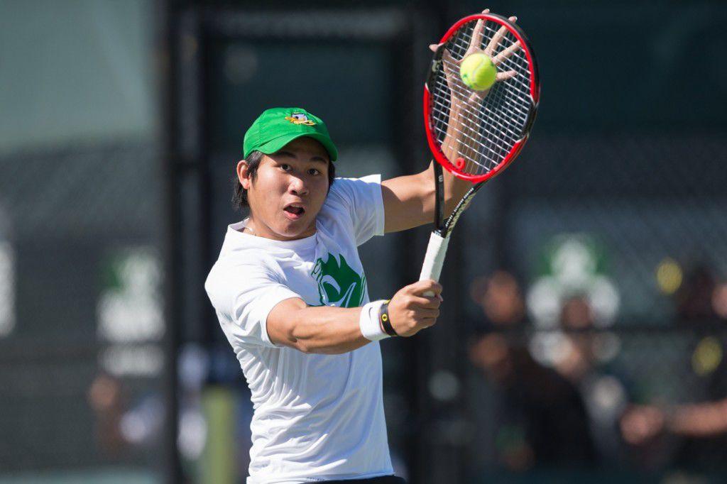 Armando Soemarno hits the ball during his doubles match. The No. 39 Oregon Ducks take on the Arizona Wildcats at the Oregon Student Tennis Center in Eugene, Ore. on April 1, 2016. (Adam Eberhardt/Emerald)