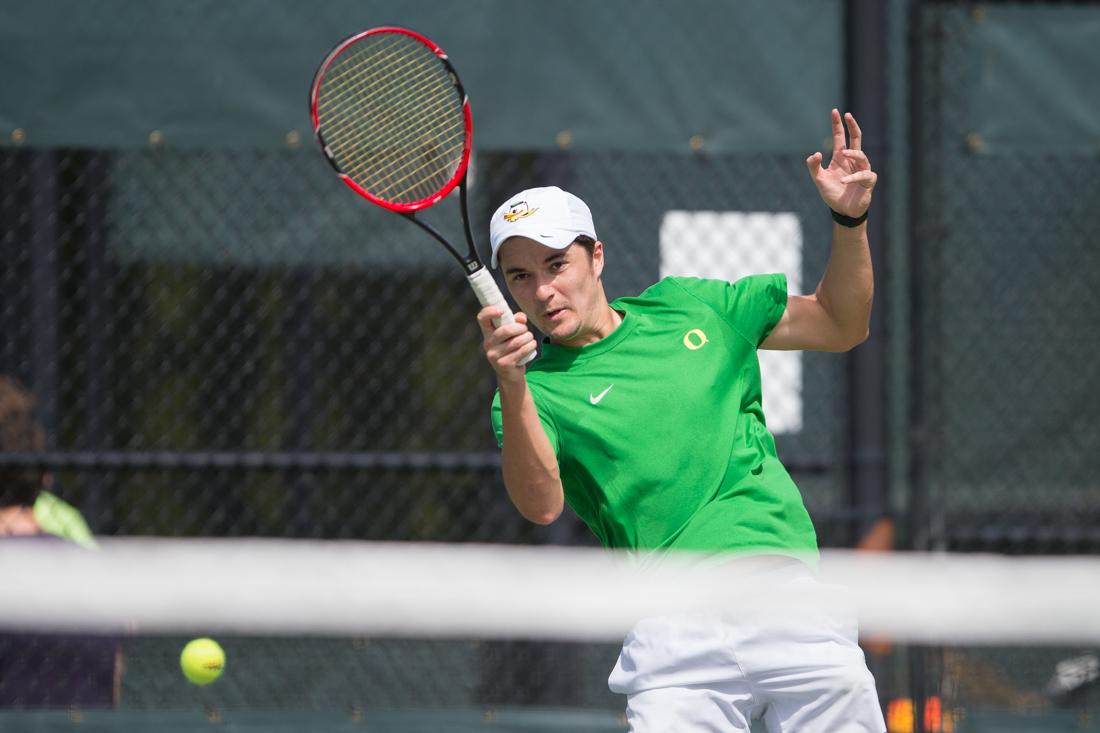 Jayson Amos hits the ball back to his opponent during his singles match. The No. 39 Oregon Ducks take on the Utah Utes at the Oregon Student Tennis Center in Eugene, Ore. on April 3, 2016. (Adam Eberhardt/Emerald)