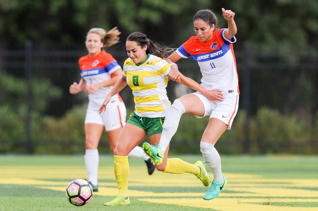 Oregon midfielder Maryn Beutler (8) tries to move the ball around Boise State midfielder Michelle Reed (11). The Oregon Ducks host the Boise State Broncos at Pap&#233; Field in Eugene, Oregon on September 2, 2016. (Kaylee Domzalski/Emerald)