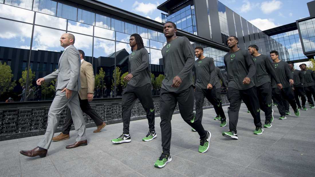 <p>Oregon Ducks do their march through the Hatfield-Dowlin Complex courtyard before the game. The No. 24 Oregon Ducks play the UC Davis Aggies for the season opener at Autzen Stadium in Eugene, Ore. on Sept. 3, 2016. (Adam Eberhardt/Emerald)</p>