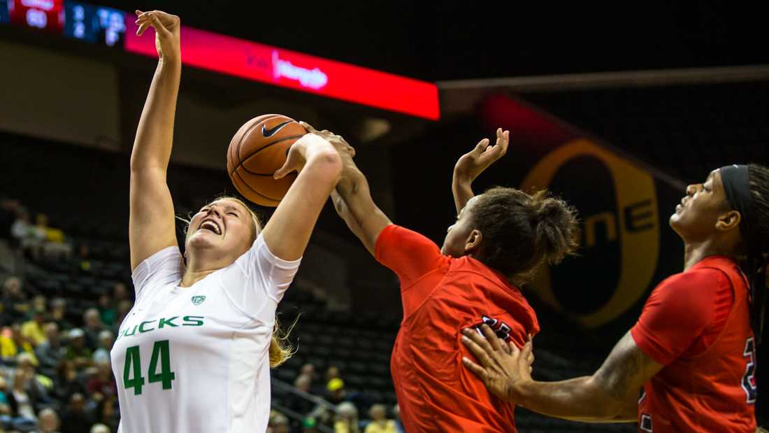 <p>Lamar Cardinals point guard Briana Laidler (4) strips the ball from Oregon Ducks forward Mallory McGwire (44). The Oregon Ducks play the Lamar Cardinals at Matthew Knight Arena in Eugene, Ore. on Sunday, Nov. 13, 2016. (Justin Hartney/Emerald)</p>