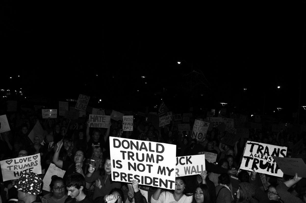 (Students and members of the Eugene community protest at various rallies and marches against new President-elect, Donald J. Trump. &#8211; Photo by Phillip Quinn)