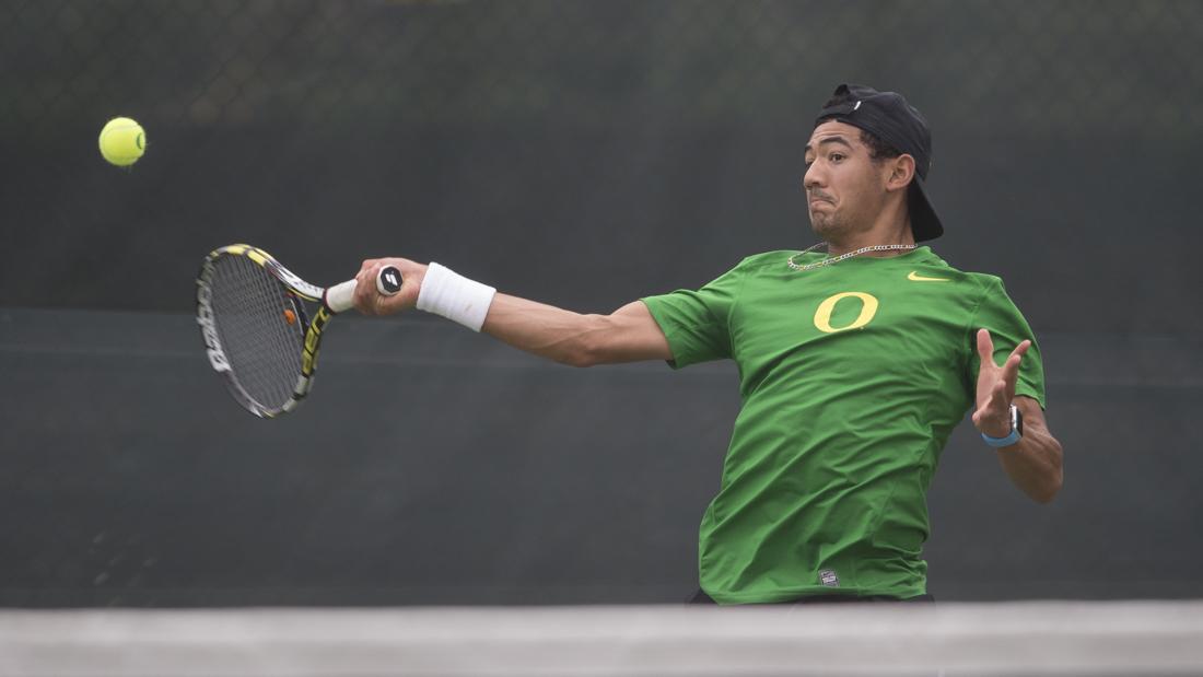 Ethan Young-Smith returns the ball to his opponent during his singles match. The No. 23 Oregon Ducks play the No. 15 Stanford Cardinal at the Oregon Student Tennis Center in Eugene, Ore. on Sunday, April 16, 2017. (Adam Eberhardt/Emerald)