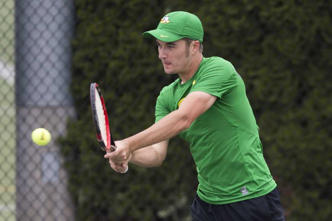 Jayson Amos returns the ball to his opponent during his doubles match. The No. 23 Oregon Ducks play the No. 15 Stanford Cardinal at the Oregon Student Tennis Center in Eugene, Ore. on Sunday, April 16, 2017. (Adam Eberhardt/Emerald)