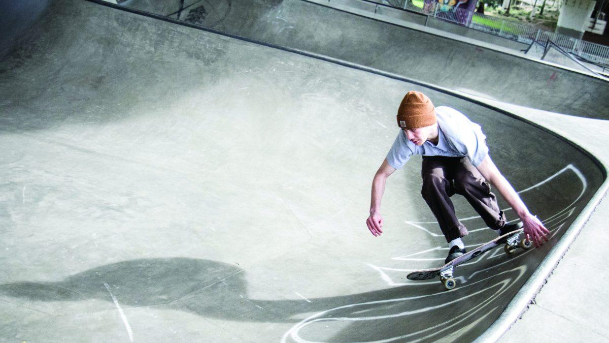 Brody Petulla enters a bowl at the WJ Skatepark and Urban Plaza in Eugene, Ore. on March 22, 2017. (Aaron Nelson/Emerald)