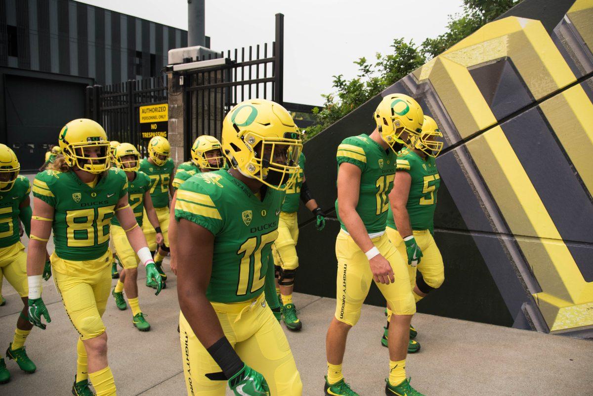 <p>Oregon corner back Ty Griffin (10) and quarterback Justin Herbert (10) enter the tunnel to Autzen Stadium. The Oregon Ducks start their season playing against the Southern Utah Thunderbirds at Autzen Stadium in Eugene, Ore. on September 2, 2017. (Phillip Quinn/Emerald)</p>