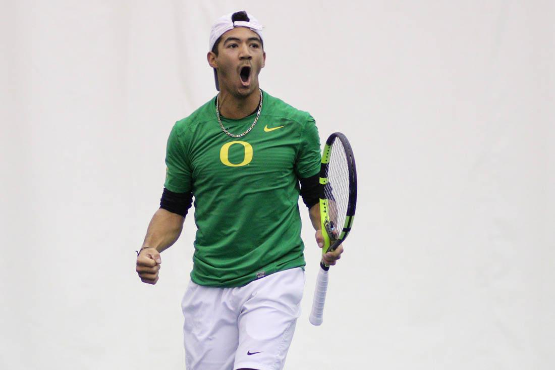 Oregon Ducks Ethan Young-Smith celebrates a point during his singles match. The Oregon Ducks face the Northern Arizona University Lumberjacks at the Oregon Student Tennis Center in Eugene, Ore. on Feb. 24, 2018. (Devin Roux/Emerald)