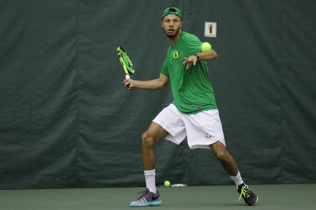 Oregon Ducks Ty Gentry looks to return the ball during his singles match. The Oregon Ducks face the Northern Arizona University Lumberjacks at the Oregon Student Tennis Center in Eugene, Ore. on Feb. 24, 2018. (Devin Roux/Emerald)