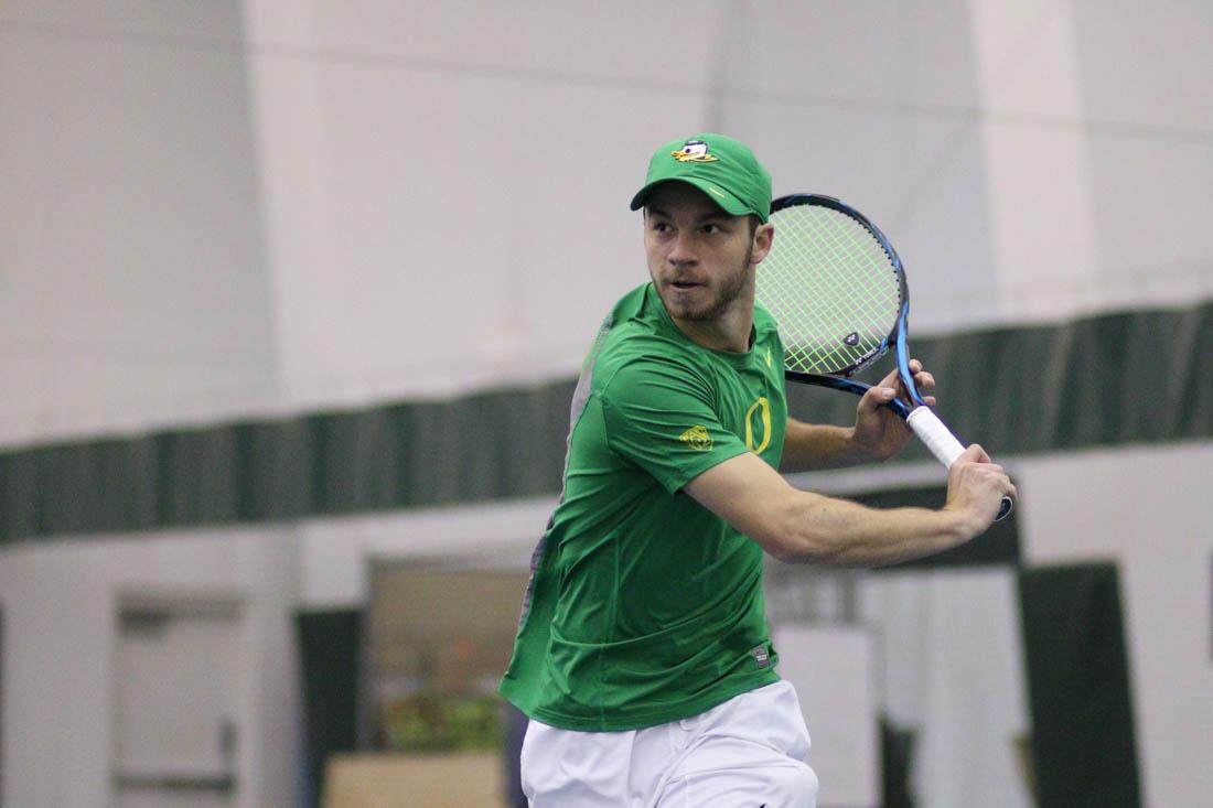 Oregon Ducks Simon Stevens watches the ball during his singles match. The Oregon Ducks face the Northern Arizona University Lumberjacks at the Oregon Student Tennis Center in Eugene, Ore. on Feb. 24, 2018. (Devin Roux/Emerald)