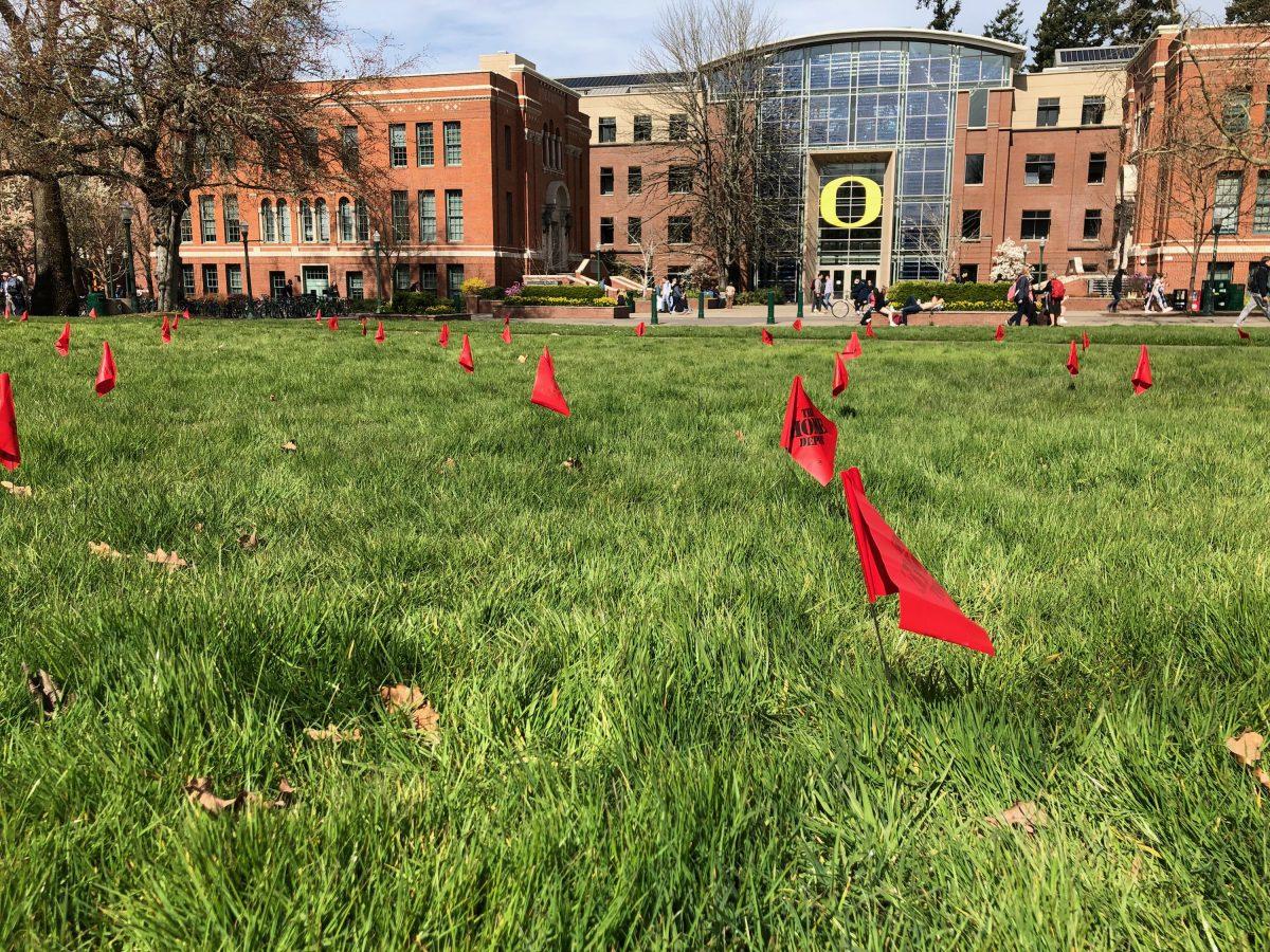 A total of 732 little flags flap in the wind from the lawn in front of the Knight Library Monday morning &#8212; 288 red and 444 yellow. The red flags represent gun-related deaths in U.S. schools since the Thurston High School shooting in Springfield, Oregon in May of 1998. The &#8230;