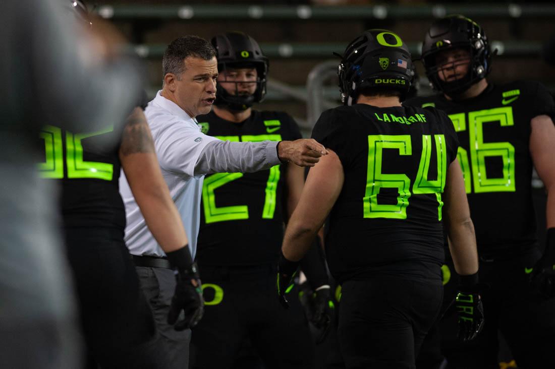 Oregon Ducks Head Coach Mario Cristobal directs warm ups before the game. Oregon Ducks football takes on Arizona State at Autzen Stadium in Eugene Ore. on Nov. 17, 2018. (Devin Roux/Emerald)