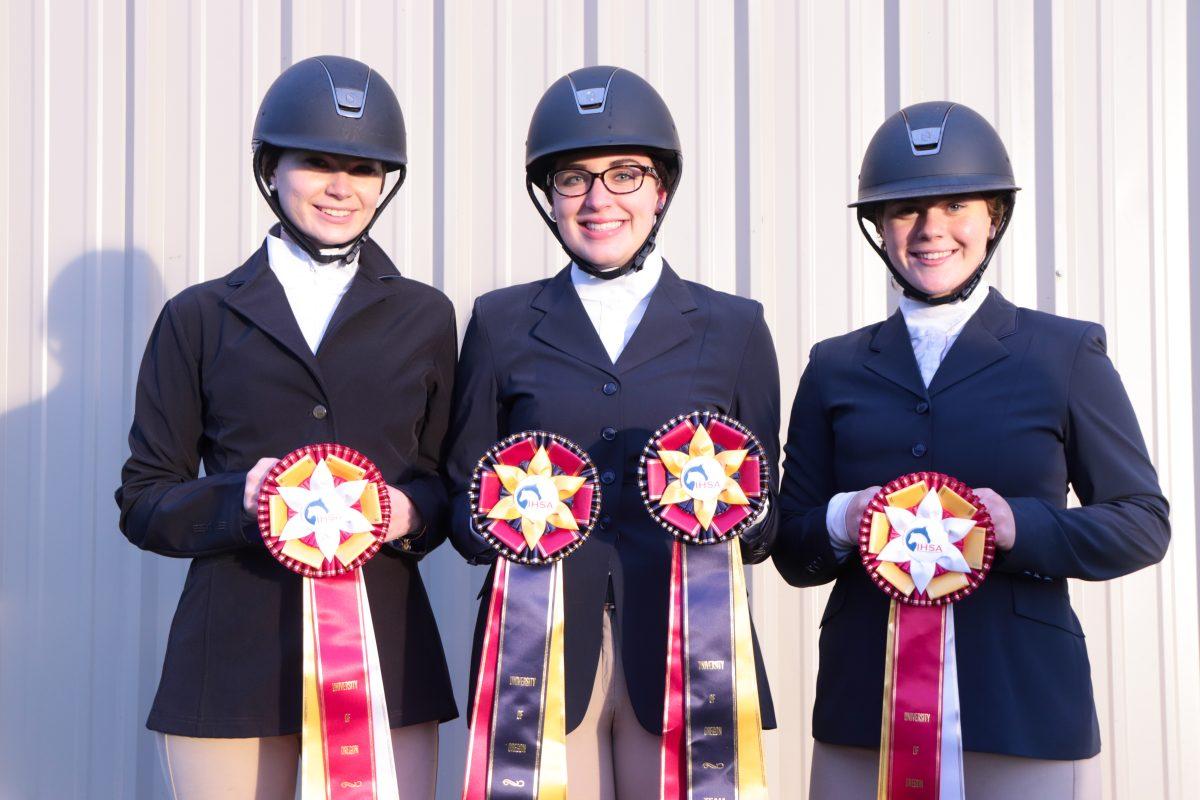 (Left to right) Members of the English Executive Board: Grace Walker, Brittany Komlofske and Michaela Warner. (Courtesy of Tayler Bicandi)