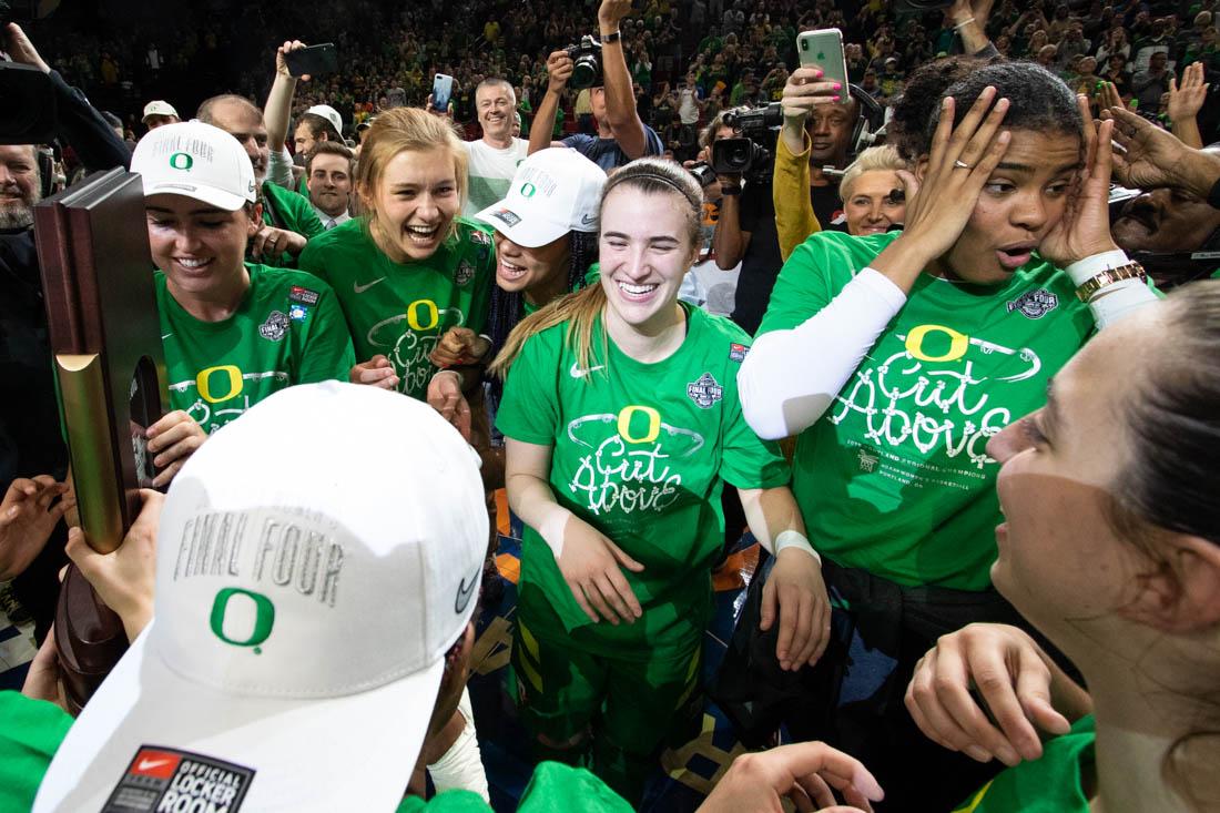 The Oregon Ducks celebrate the win over Mississippi State. Oregon Ducks women&#8217;s basketball takes on Mississippi State at the Moda Center in Portland, Ore. on March 31, 2019. (Devin Roux/Emerald)