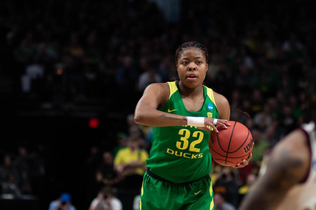 Oregon Ducks forward Oti Gildon (32) looks for an open pass. Oregon Ducks women&#8217;s basketball takes on Mississippi State at the Moda Center in Portland, Ore. on March 31, 2019. (Devin Roux/Emerald)