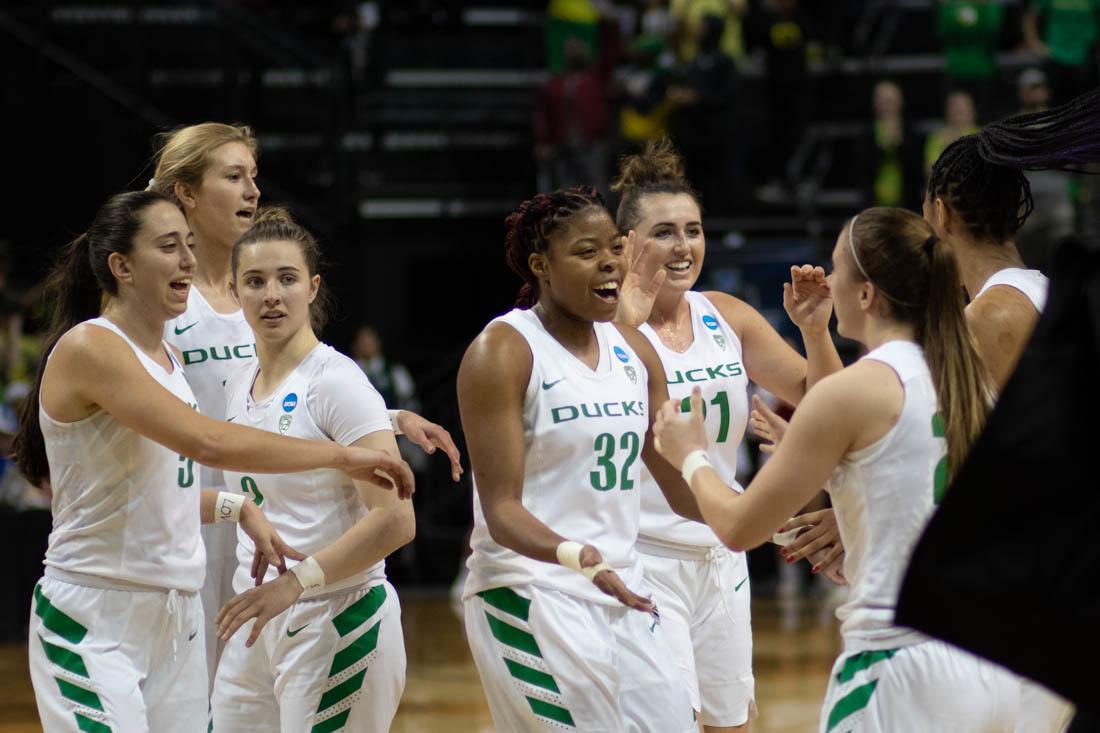 The Ducks celebrate the win over Indiana. Oregon Ducks women&#8217;s basketball takes on Indiana University in the second round of the NCAA Championship at Matthew Knight Arena in Eugene, Ore. on March 24, 2019. (Devin Roux/Emerald)