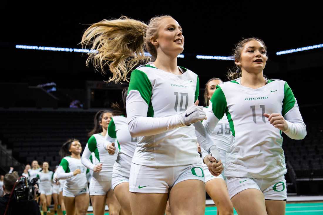 Ducks seniors Hannah Blair (10) and Casi Jackson (11) take the court during the meet against Arizona Christian University on Feb. 23, 2019. (Sarah Northrop/Emerald)