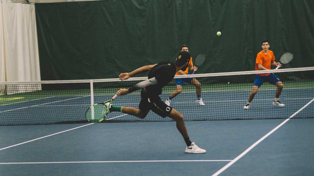 The ball whizzes back towards the Boise State players after a return from junior Ty Gentry. Oregon Ducks men&#8217;s tennis takes on Boise State University at the Student Tennis Center in Eugene, Ore. on Feb. 08, 2019. (Connor Cox/Emerald)