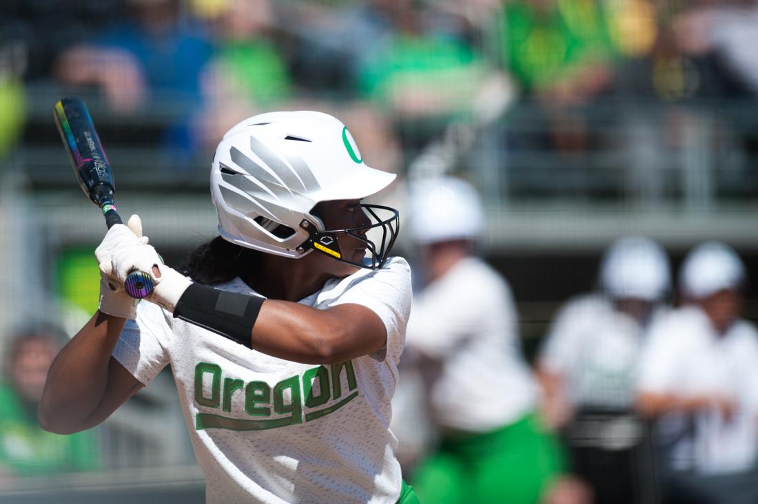 <p>Ducks outfielder Cherish Burks (31) winds up to hit the ball. Oregon Ducks softball takes on Oregon State University at Jane Sanders Stadium in Eugene, Ore. on April 26, 2019. (Ben Green/Emerald)</p>