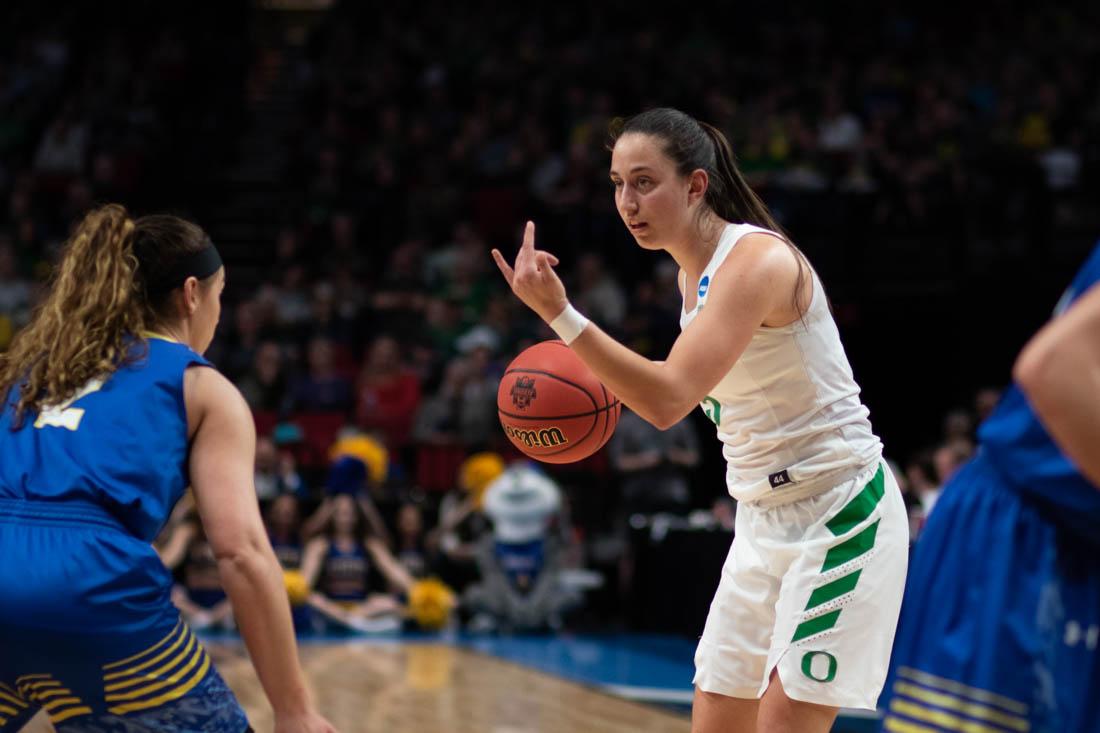 Oregon Ducks guard Maite Cazorla (5) looks for an open pass. Oregon Ducks women&#8217;s basketball takes on South Dakota State University at the Moda Center in Portland, Ore. on March 29, 2019. (Devin Roux/Emerald)