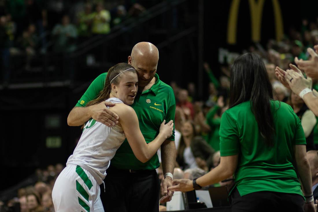 Oregon Ducks Head Coach Kelly Graves hugs Oregon guard Sabrina Ionescu (20). Oregon Ducks women&#8217;s basketball takes on Indiana University in the second round of the NCAA Championship at Matthew Knight Arena in Eugene, Ore. on March 24, 2019. (Devin Roux/Emerald)