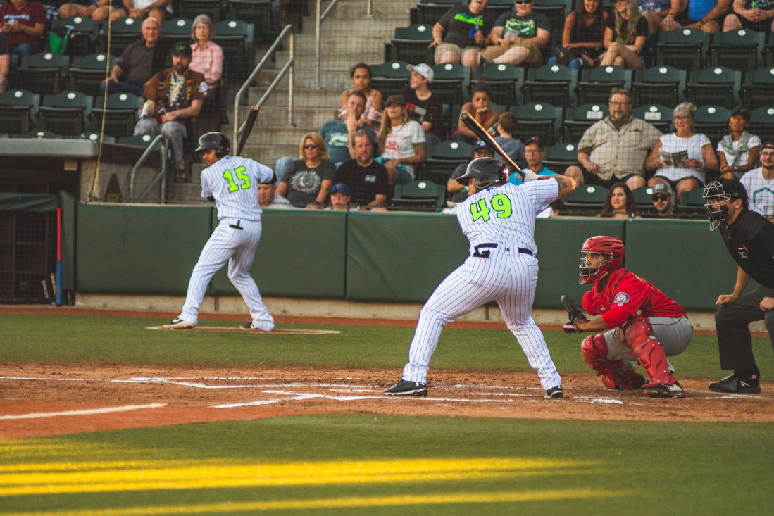 Eugene Emeralds catcher Alexander Guerra (49) prepares to strike a pitch from a Spokane pitcher. The Eugene Emeralds play Spokane at PK Park in Eugene, Ore. on August 1, 2019. (Brad Smith/Emerald)