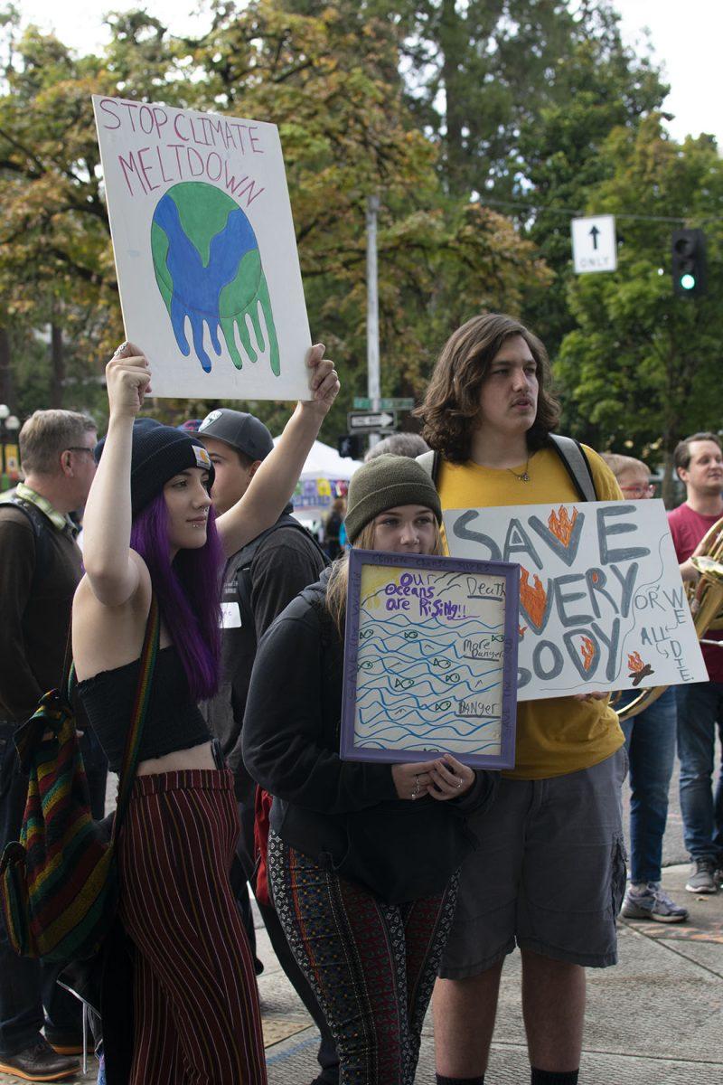 Bailee, Serenity and Max come from Network Charter to participate in the strike. &#8220;Climate change is real and people don&#8217;t think it&#8217;s facts when it&#8217;s straight facts,&#8221; Bailee says. The Global Strike for Climate in Eugene, Ore. takes place at the Wayne Morse Free Speech Plaza on Sept. 20, 2019. (Kimberly Harris/Emerald)