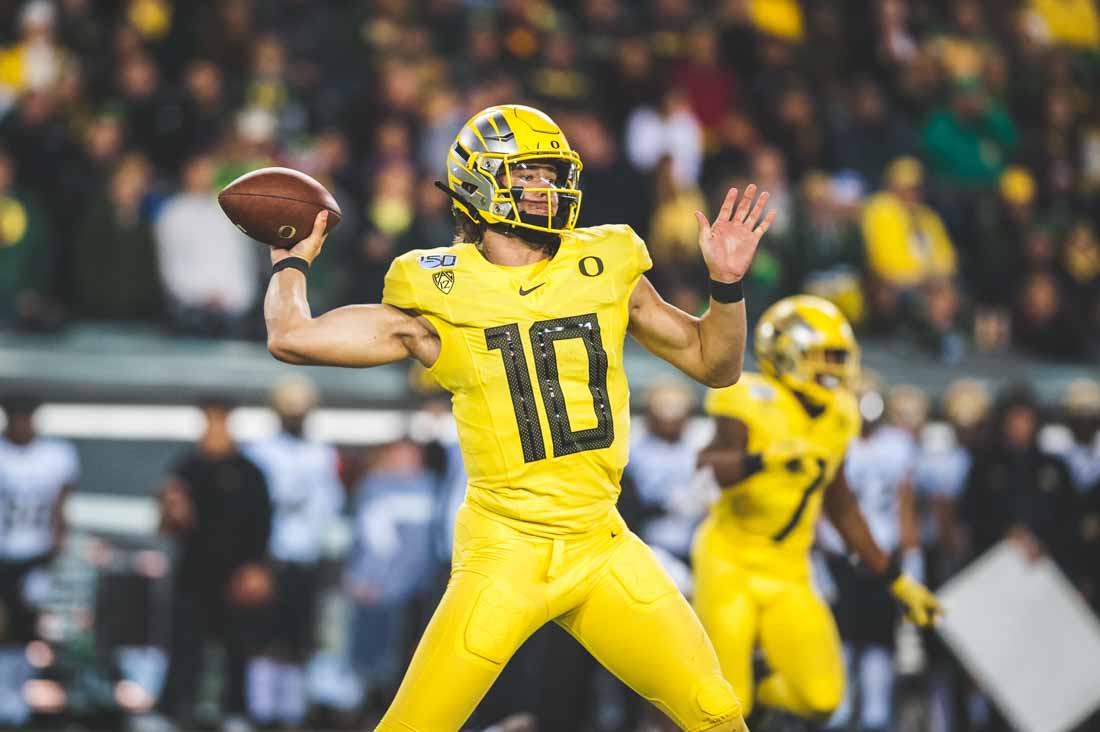 Ducks quarterback Justin Herbert (10) throws from the pocket. Oregon Ducks Football takes on the Colorado Buffaloes at Autzen Stadium in Eugene, Ore. on Oct. 11, 2019. (DL Young/Emerald)