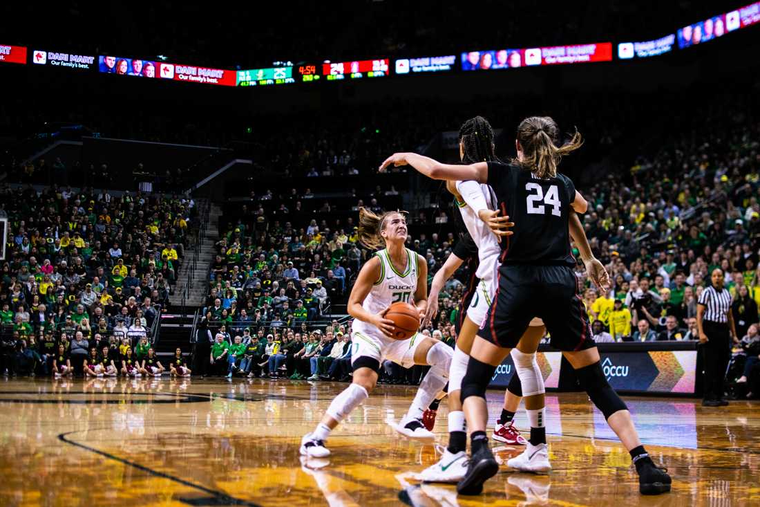 Ducks guard Sabrina Ionescu (20) about to shoot a three-pointer. Oregon Ducks women's basketball takes on Stanford at Matthew Knight Arena in Eugene, Ore. on Jan. 16, 2020. (Kimberly Harris/Emerald)