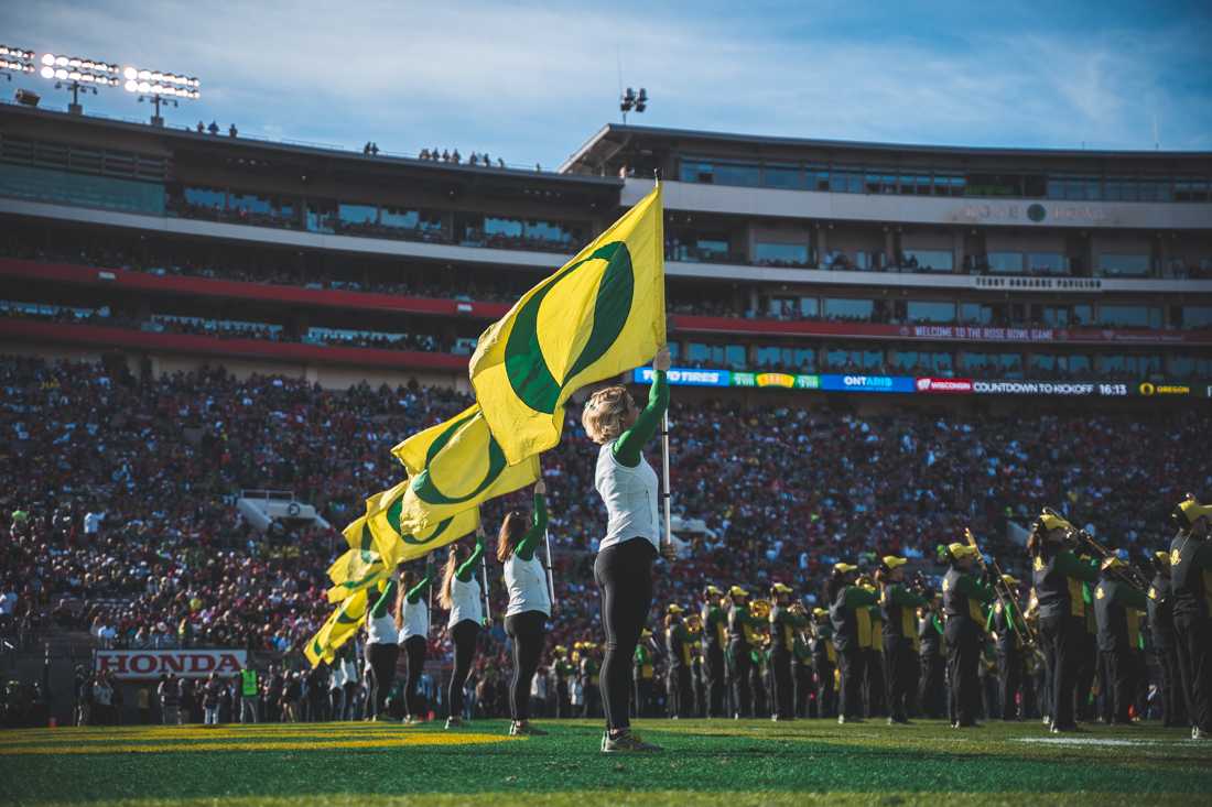 The ducks marching band opens the rose bowl game. Oregon Ducks football takes on Wisconsin for the 106th Rose Bowl Game at Rose Bowl Stadium in Pasadena, Calif. on Jan. 1, 2020. (DL Young/Emerald)