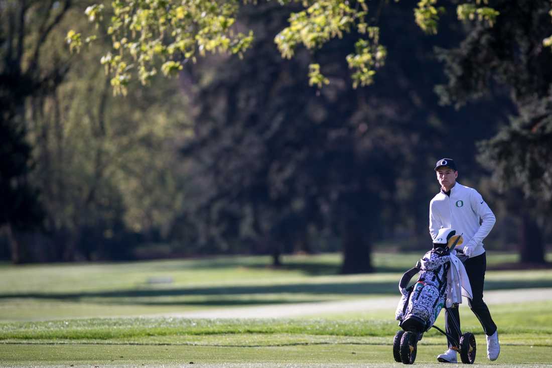 <p>Freshman Tom Gueant walks up the course. Oregon Ducks men's golf plays in the Pac-12 Championships at Eugene Country Club in Eugene, Ore. on April 22, 2019. (Ben Green/Emerald)</p>