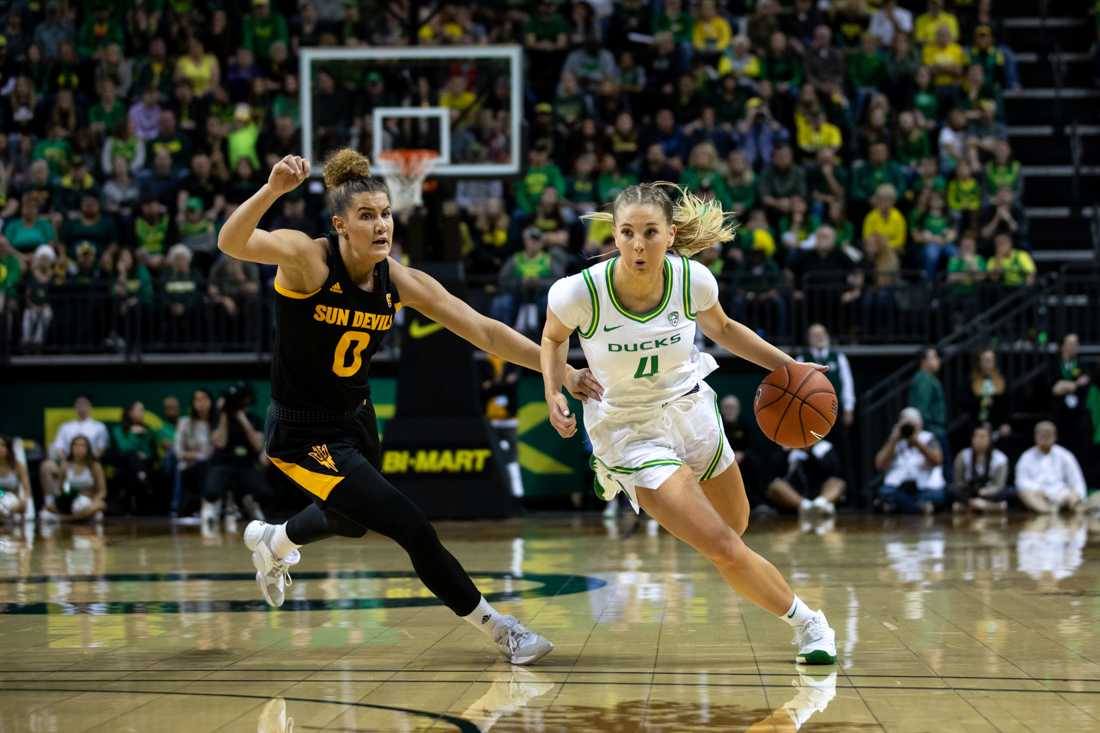 <p>Oregon Ducks guard Jaz Shelley (4) drives the ball towards the basket. Oregon Ducks women’s basketball takes on the Arizona State Sun Devils at the Matthew Knight Arena in Eugene, Ore. on Feb 9, 2020. (Maddie Knight/Emerald)</p>